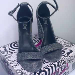 Beautiful, SHINY Trash Silver heels size 8.5
